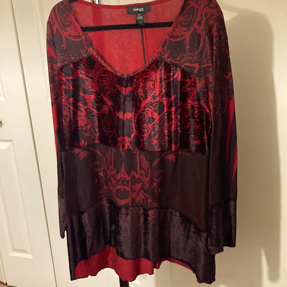 Tunic length . rich deep burgundy red w some black overtone.  size 2x